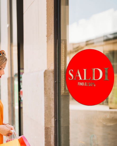 Adesivo "Saldi fino al 50%" con cerchio intagliato